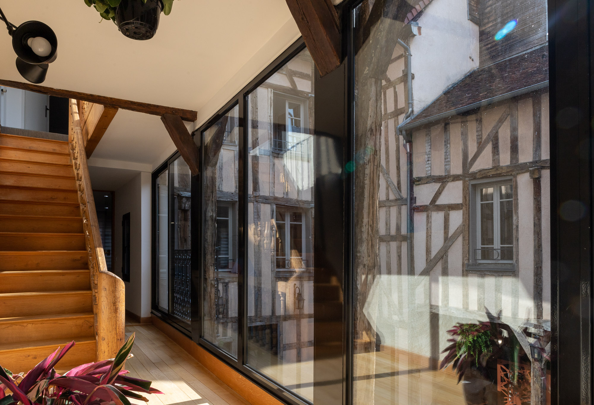 A photo of a black window in a house